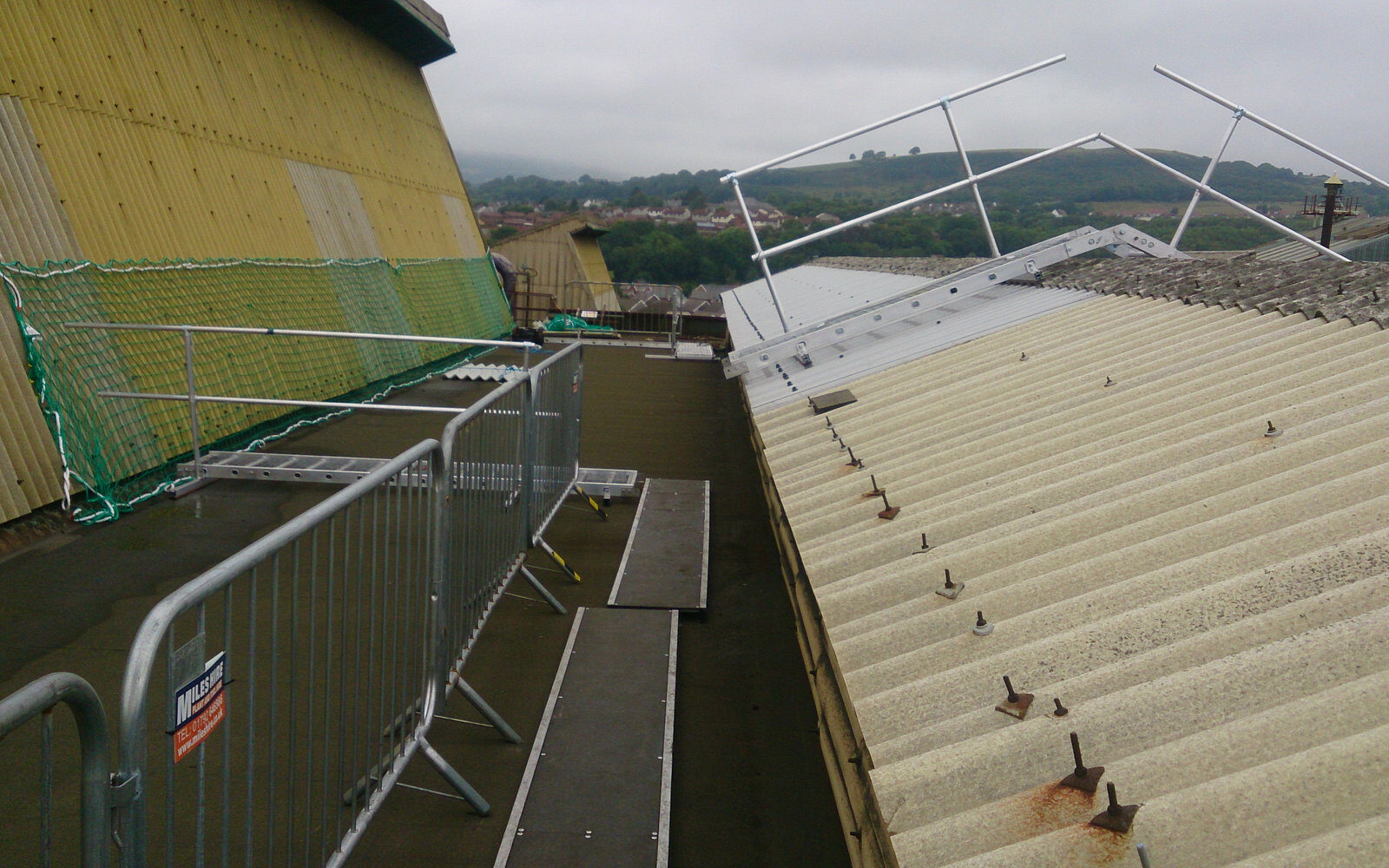 Over-cladding an existing roof